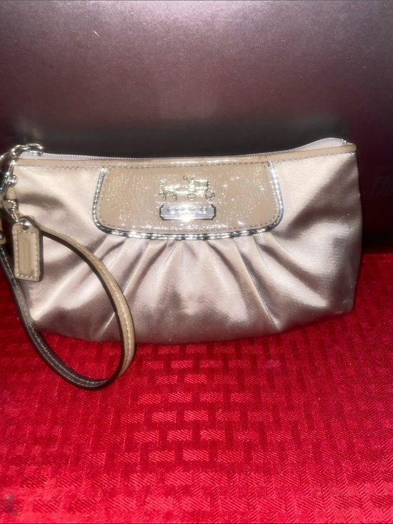 Coach Handbags - Coach Metallic Taupe Satin Wristlet with Gold Hardware